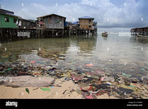 Plastic Trash And Other Garbage Make For An Ugly Beach Scene On Mabul