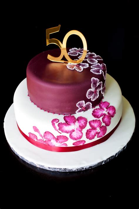 Chocolate birthday cake design, kids are crazy about spongy cakes, especially that are filled with luscious chocolate flavors, molten chocolates, brownies, whipped creams, and chocolate desserts. Jocelyn's Wedding Cakes and More....: Custom Cake/Elegant Design/50th Birthday