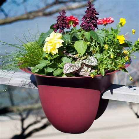 These flower pots are designed to accent any style. Greenbo Railing Planter » Gadget Flow