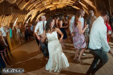 Looking for garter toss songs that are a little bit more spicy than you can leave your hat on? A wedding at Pretty Place and Robin Hood Barn! | Mozingo Photography