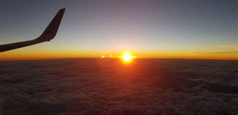 Free Images Wing Horizon Clouds Plane Sun Sunrise Sunset