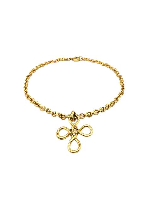 Chanel Gold Cc Wrapped Cross Necklace · Into