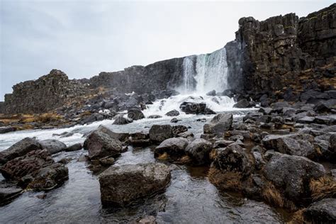 Öxarárfoss Waterfall Cascades Into Almannagjá Gorge Þingvellir Golden