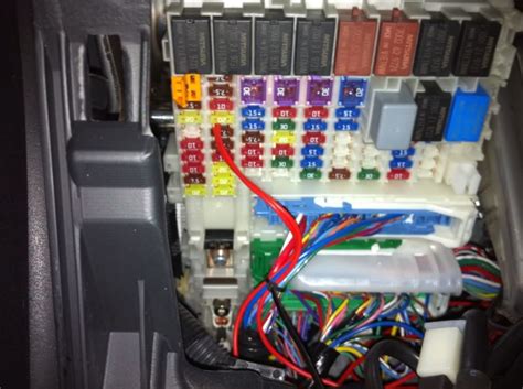 The interior fuse box is behind the tabs as shown. 2009 Nissan 370z Fuse Box Diagram - Wiring Diagram Schemas
