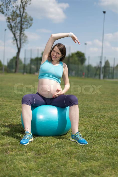 Pregnant Woman Excercises With Gymnastic Ball Stock Image Colourbox