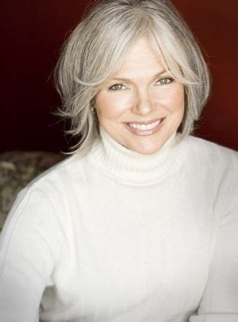 Gray hair can still look youthful, thanks to today's haircuts that incorporate long layers for slightly curled tips. 50 year old woman - Google Search | Hair beauty, Silver ...