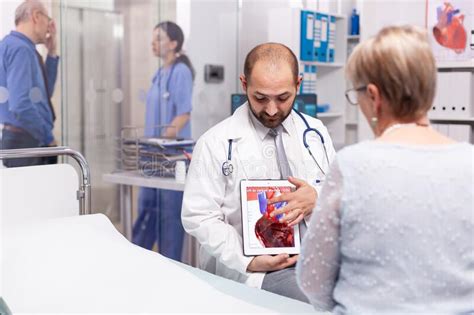 Doctor Talking About Efect Of Heart Attack Stock Photo Image Of