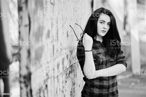 Portrait Girl With Red Lips Wearing A Red Checkered Shirt Stock Photo