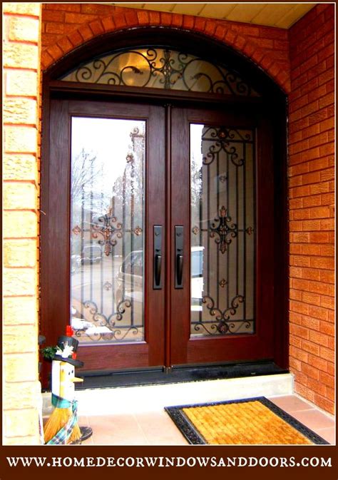 Custom Wrought Iron Double Door With Matching Transom Complete With