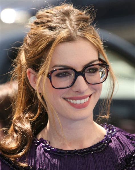 anne hathaway s going for the geek chic look and she actually looks good ok magazine