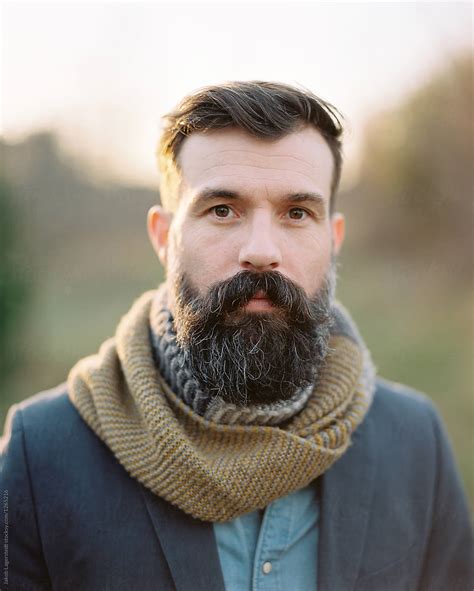 portrait of a handsome man with a beard by stocksy contributor jakob lagerstedt stocksy