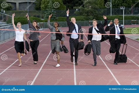 Group Of Business People Crossing The Finish Line Stock Images Image