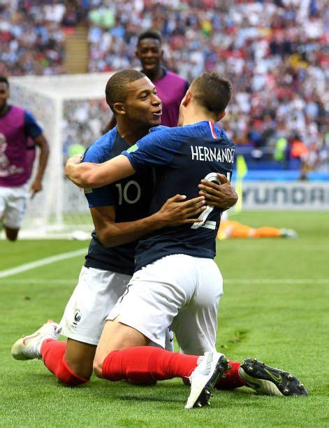 kylian mbappe of france celebrates with teammate lucas hernandez after scoring his team s third