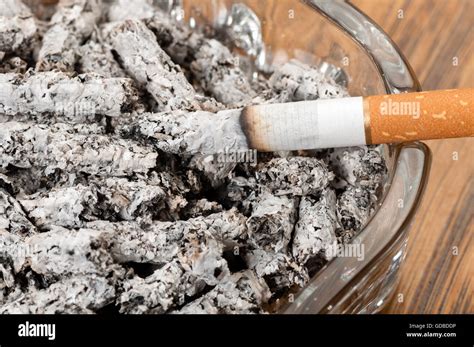 Cigarette Ashes In An Ashtray And Cigarette Close Up Stock Photo Alamy