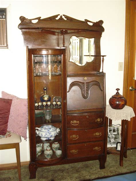 In the dining room, a secretary desk with a glass hutch is a lovely way free up space in your kitchen and display special occasion items. Antique secretary desk with hutch - Furniture table styles