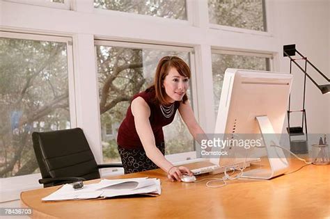 Bent Over Table Photos And Premium High Res Pictures Getty Images