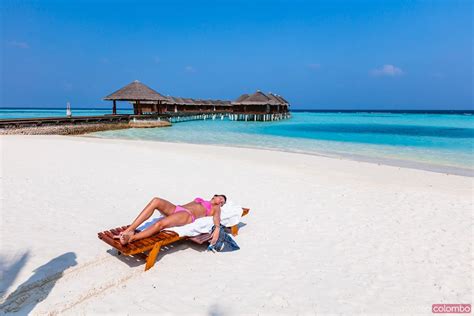 Woman Sunbathing On Lounge Chair Maldives Royalty Free Image