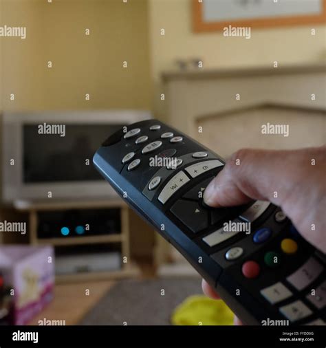 Using Tv Remote Stock Photo Alamy