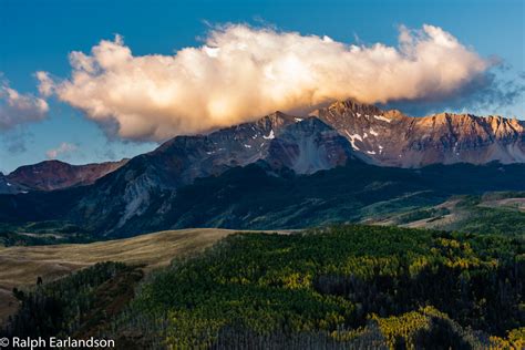 A Cloud Greets The Sun Sunrise Over Wilson Peak Near Tell Flickr