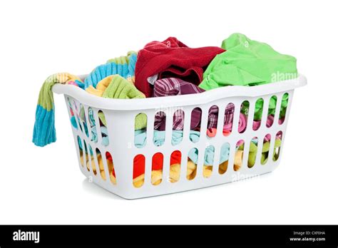 White Plastic Laundry Basket Full Of Dirty Clothes Stock Photo Alamy