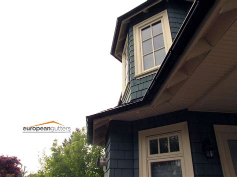 Installation of Lindab Rainline Gutters on this Vancouver heritage home ...