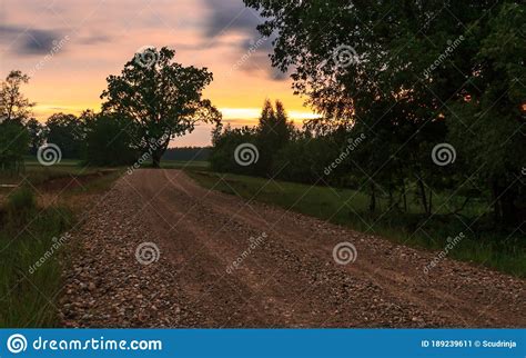 Field And Country Road Natural Sunset Colours Stock Image Image Of