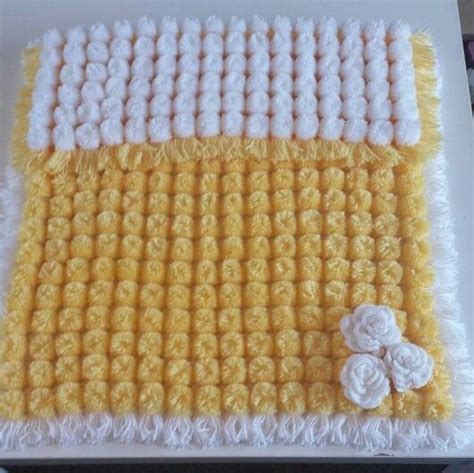 These pom pom patterns are a great way for young kids to learn one of the basic maths concepts. Pretty Pom Pom Baby Blanket - Free Video Tutorial | Pom ...