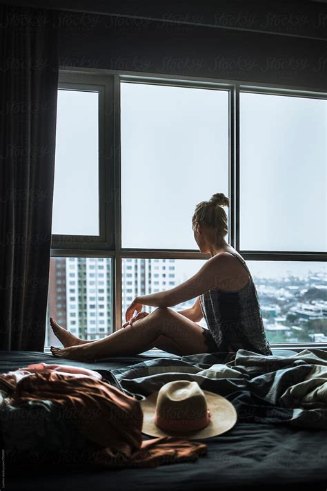 Woman Sitting In A Hotel Room By Stocksy Contributor Lumina Stocksy