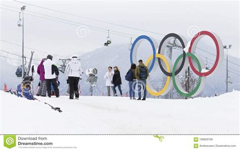 People Are Photographed Near The Olympic Rings Sochi Editorial Stock