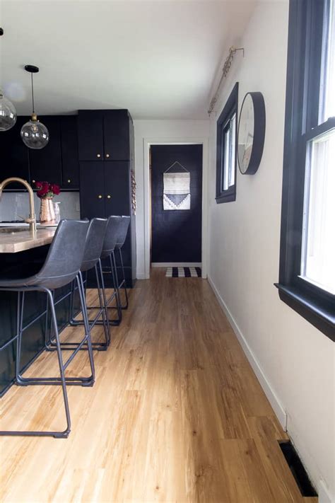 How to install hardwood floors around kitchen cabinets. Why we LOVE to Install Laminate Flooring - Bright Green Door