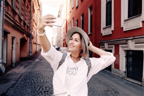 Happy Young Female Traveler Taking Selfie On Street Travel Concept