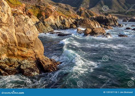 The Rugged Pacific Coast And Surf In Big Sur California Stock Photo