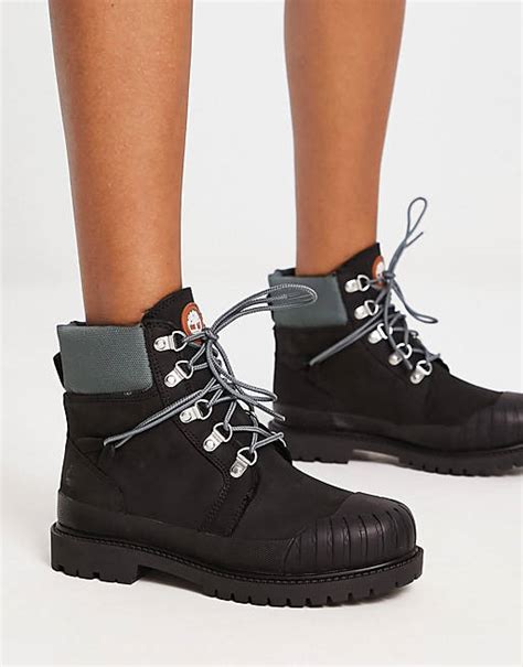 timberland 6in heritage rubber toe boots in black asos