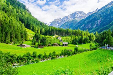 Green Meadows Alpine Cottages In Alps Austria Stock Photo Image Of