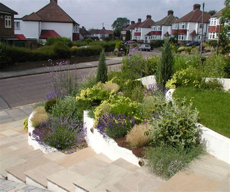Simple front garden ideas at the moment, the small front garden looks bare and uncluttered: Small Front Garden In Orpington | Millhouse Landscapes