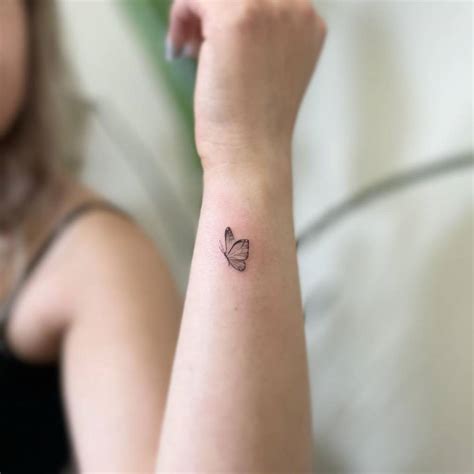 Fine Line Butterfly Tattoo On The Wrist