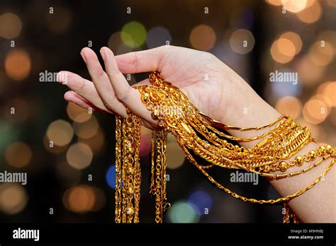 Hand Holding Expensive Gold Jewelry Hi Res Stock Photography And Images