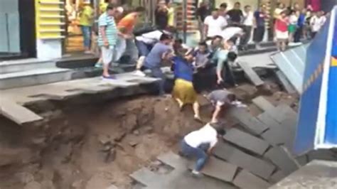 Sinkhole Swallows Ground In China Video NYTimes Com