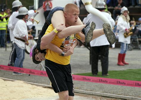 Lithuanian couple crowned 'wife carrying' world champions