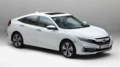 The sedan is available in five exterior colours, white orchid pearl, carnelian red pearl, modern steel metallic, golden brown. Honda Civic Price in Surat - November 2020 On Road Price ...