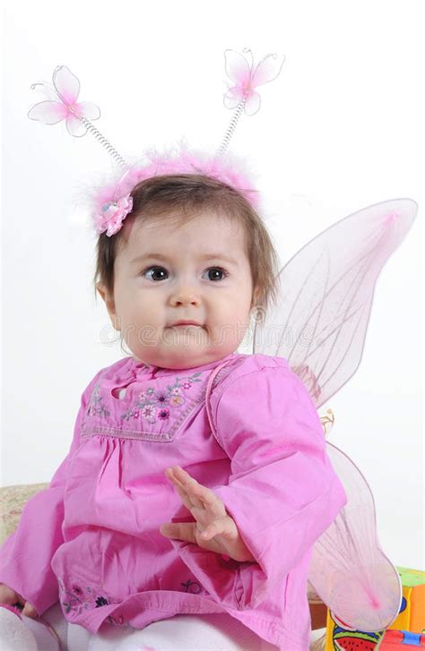 The Small Beautiful Girl In Pink Clothes Stock Photo Image Of