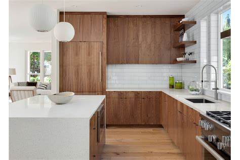 One of the major reasons homeowners are compelled to replace their countertops starts with the if you are leaning towards delaying a remodel because you are not yet ready to part with your appliances, maybe these 5 white kitchens will provide. white quartz countertop black sink light brown cabinets ...