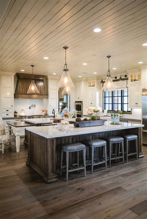 We have shiplap all over our house and its clean lines make it one of my favorite design elements to use! stained floor, stained island & shiplap ceiling ...