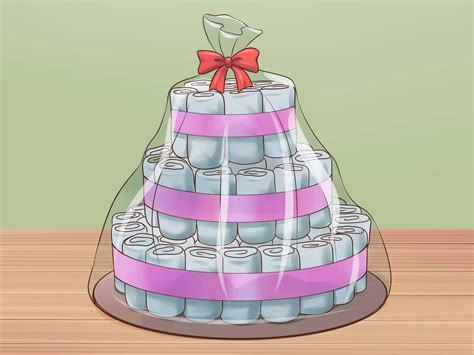 There's also a perfect place for the baby boy's (or girl's) name under a banner and a pretty this baby shower cake idea sits on a slice of wood for a platter and is elevated atop a wooden box. 3 Ways to Make a Diaper Cake - wikiHow