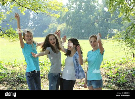 Group Of Young Teenage Friends Cheering Stock Photo Alamy