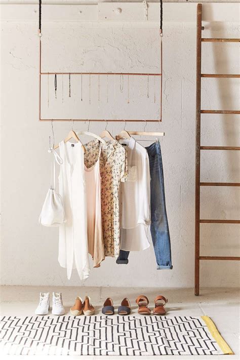 Many space saver foldable clothes drying racks are available. How to Display Your Capsule Wardrobe