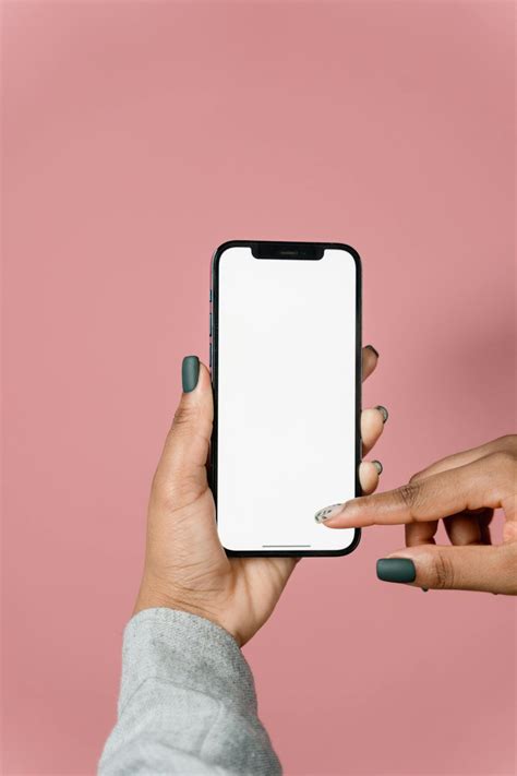 Person Holding White Iphone 5 C · Free Stock Photo