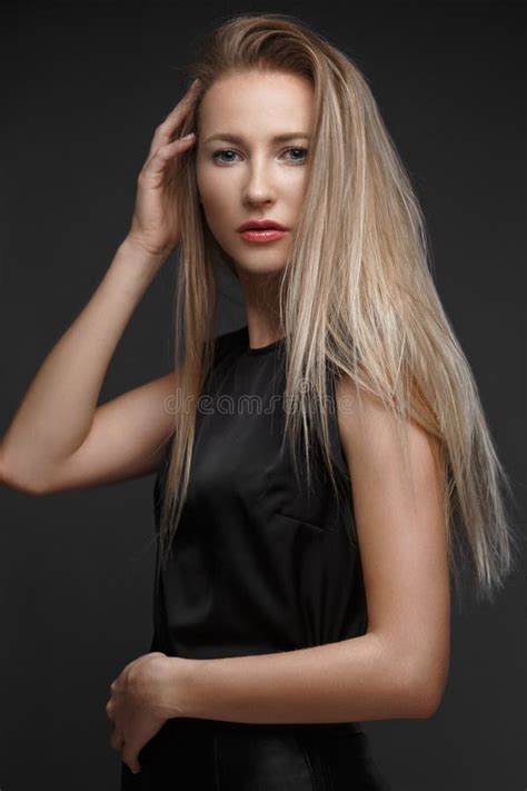 Fashion Model With Long Hair Young European Attractive Beautiful Eyes Perfect Skin Is Posing
