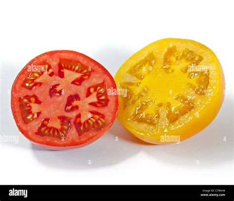 Red And Yellow Beefsteak Tomato Halves Stock Photo Alamy
