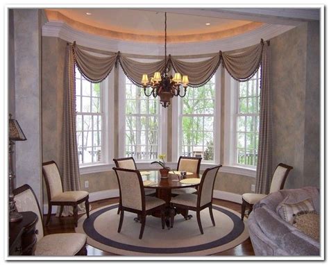 In this room, we often see double wide draperies that have been swept off to one side and are held in place with a heavy tassel tieback. Pin on dining decor ideas